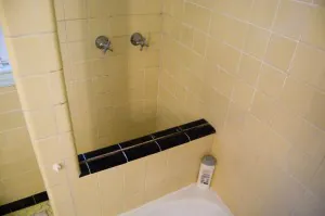 1920s-bathroom-unique-tub-and-shower-configuration 1920s-bathroom-unique-tub-and-shower-configuration