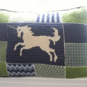 unicorn pillow in needlepoint