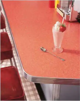 formica-boomerang-laminate-coral boomerang countertop with plaid floor