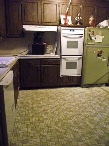 1960s kitchen with avocado floor and refrigerator