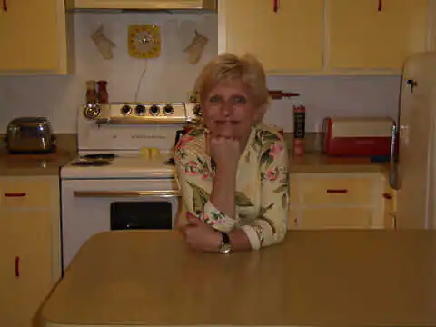 jana-in-her-vintage-yellow-kitchen yellow kitchen