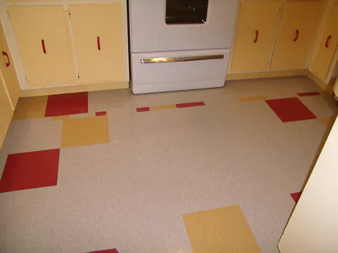 tile floor with red and yellow red yellow and white tile floor