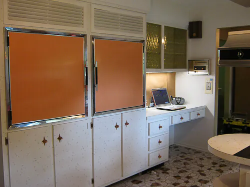 1960s kitchen with wall refrigerator freezer