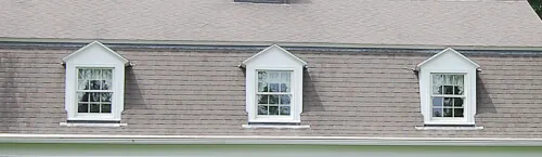 matching windows in a dutch colonial house
