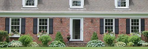 window boxes on a dutch colonial house