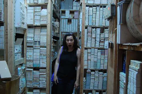 pam tours the basement storage area of world of tile
