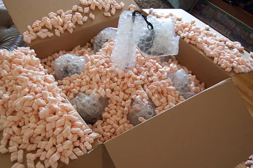 styrofoam peanuts UPS Store packed my lightolier light