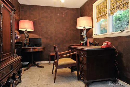 1960s-leather-paneled-den-terrazzo-floors cork panelled den