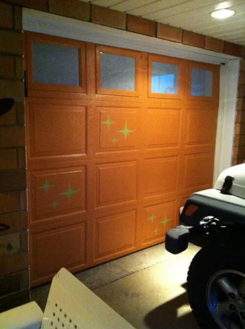 starburst stencils on a garage door