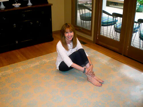 lauren with her diy painted linoleum rug