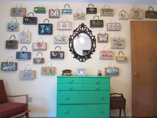 vintage-Enid-Collins-Purse-collection on wall