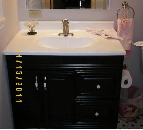 bathroom vanity after painting with rustoleum cabinet transformations review