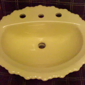 Yellow sun burst 20 X 17 inch oval 8 inch spread lavatory sink