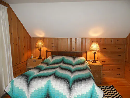 knotty-pine-bedroom-in-attic