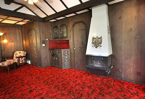 Mid-century-midieval-room-with-wall-mount-fireplace
