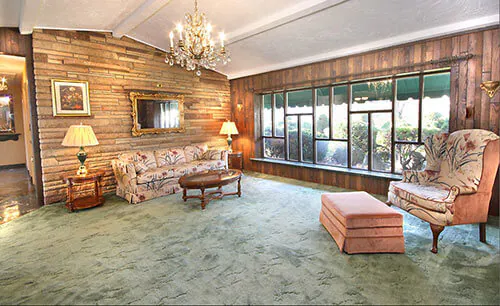 mid-century-retro-living-room-stone-wall-and-picture-window