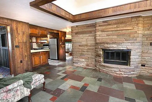 mid-century-retro-stone-fireplace-with-slate-floor
