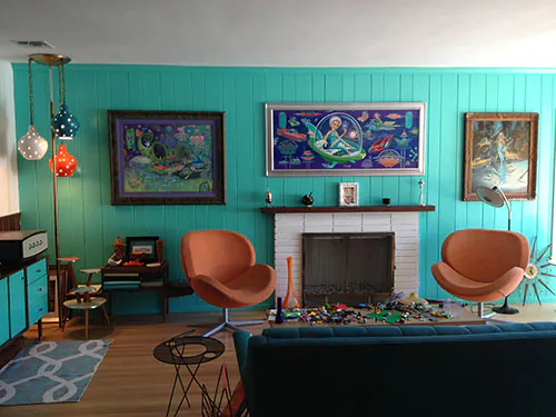 white fireplace in colorful retro room