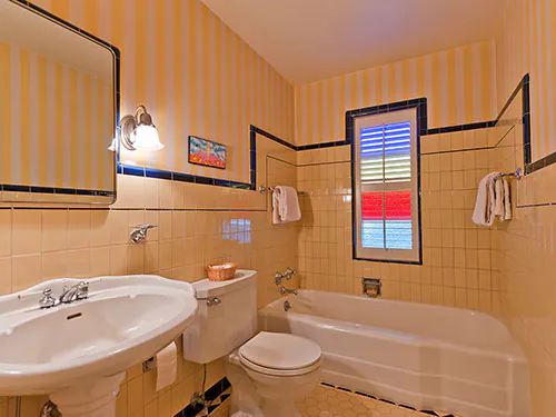 yellow-and-black-ceramic-tile-vintage-bathroom
