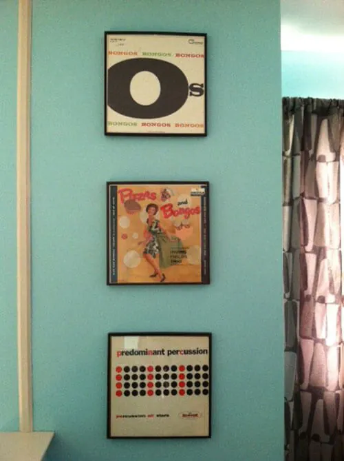 framed LPs on a wall