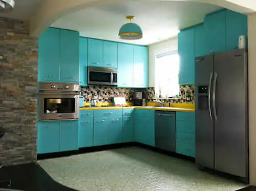 turquoise kitchen cabinets in a retro kitchen