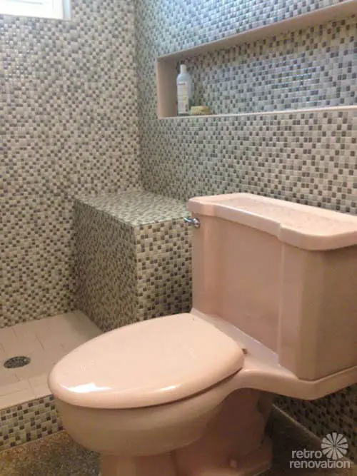 midcentury bathroom tiled with half inch .5 inch tile