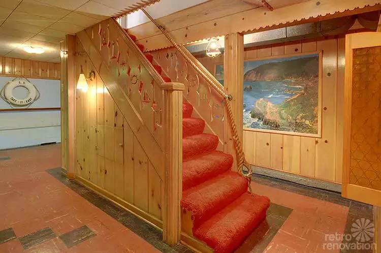 nautical theme basement with knotty pine panelling