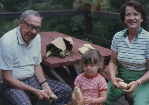 Many of my favorite childhood memories don't include stuff, it is about spending time with people you love. Above: Helping Bob and Nana shuck corn for dinner during their visit in 1985.
