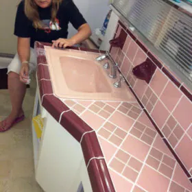 pink and maroon midcentury bathroom