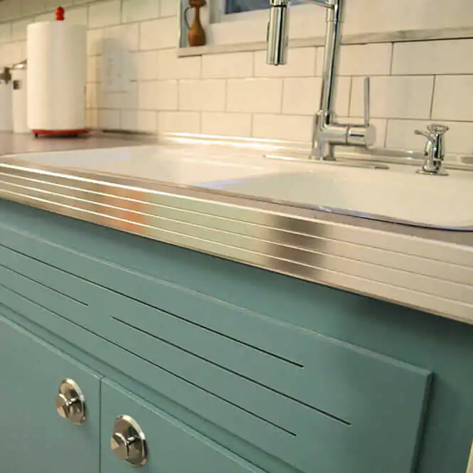 ribbed metal counter edge in a retro kitchen