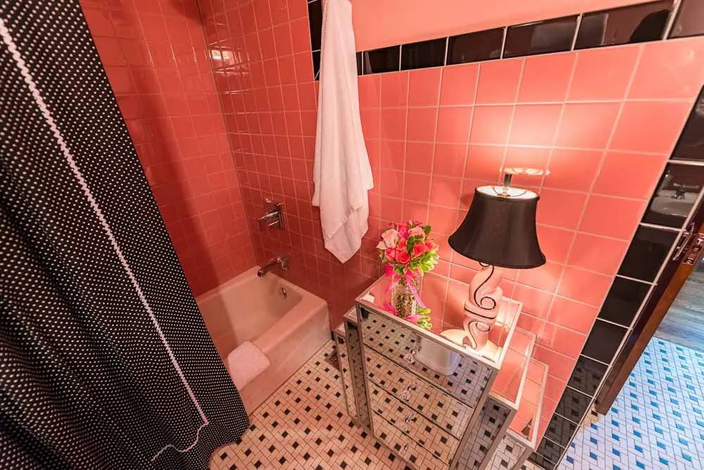 gorgeous pink mid century bathroom built new