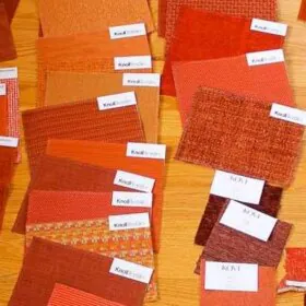 orange upholstery samples for a mid century modern sofa or chair
