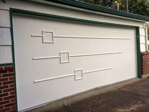 wood trim applied to garage door to add mid century modern look