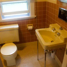 brown and yellow bathroom