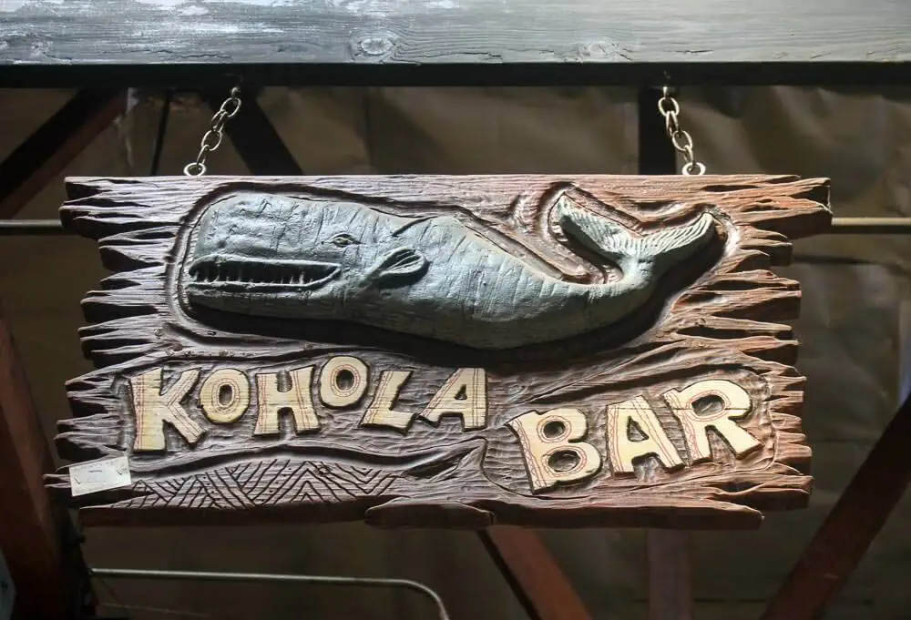 carved sign Kohola Bar with whale by LeRoy Schmaltz