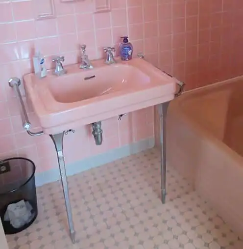 vintage sink with chrome legs