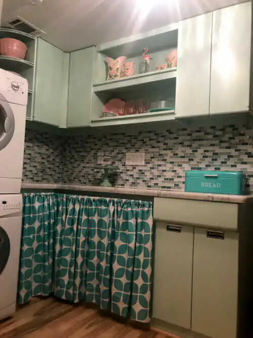 retro laundry room with sears steel kitchen cabinets