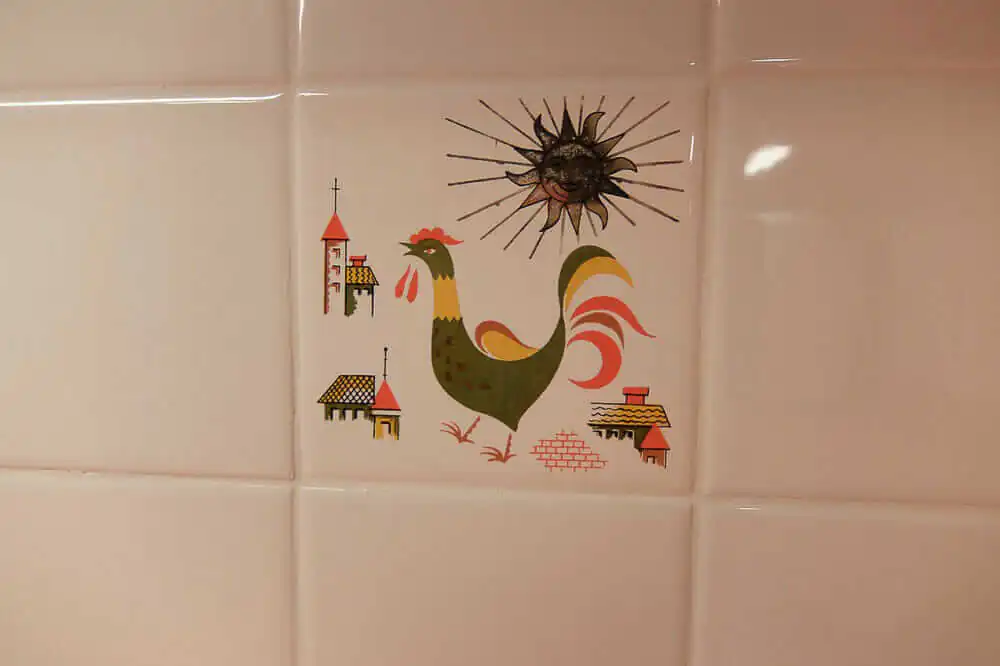 vintage trivets used as wall tile