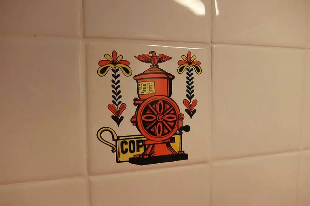 vintage trivet used as wall tile
