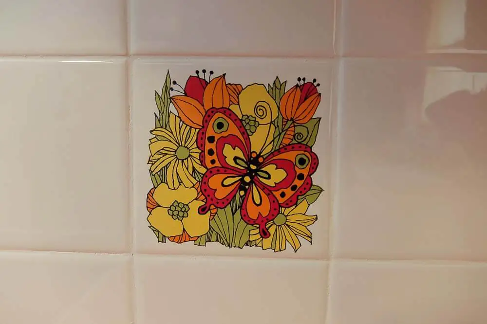 vintage trivet used as wall tile