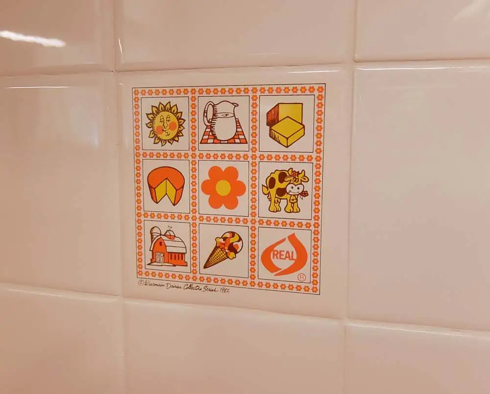 vintage trivets used as wall tile