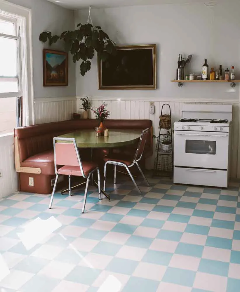 Blue and white checker floor in a retro or farmhouse style kitchen.